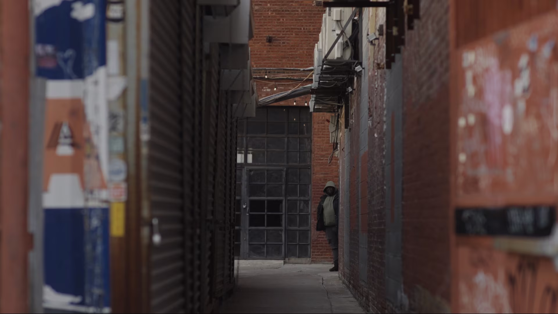Landlord is Late on His Rent — a man in the alley